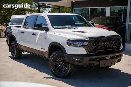 White 2025 RAM 1500 Crew Cab Utility Rebel Hurricane