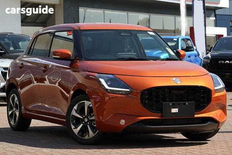 Orange 2025 Suzuki Swift Hatchback Hybrid Glx