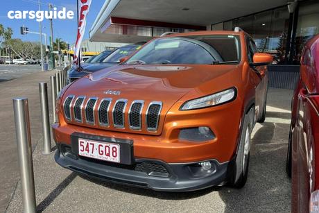 Orange 2014 Jeep Cherokee Wagon Longitude (4X4)