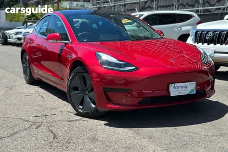 Red 2020 Tesla Model 3 Sedan Standard Range Rwd