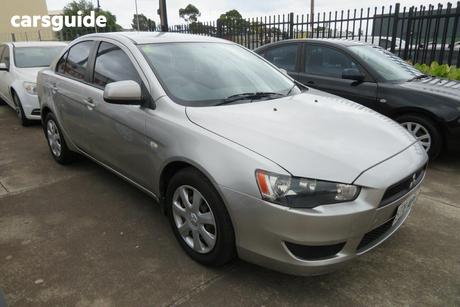 Gold 2012 Mitsubishi Lancer Sedan Es