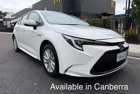 White 2023 Toyota Corolla Sedan Ascent Sport Hybrid