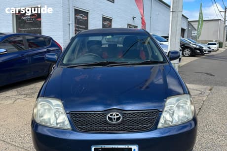 Blue 2004 Toyota Corolla Sedan Conquest