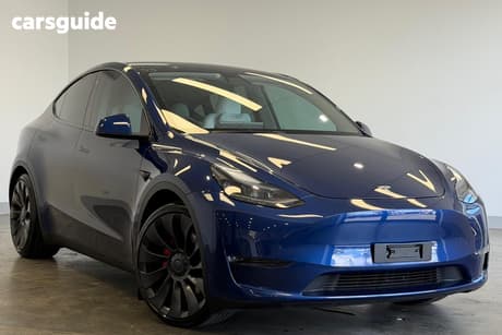 Blue 2023 Tesla Model Y Wagon Performance