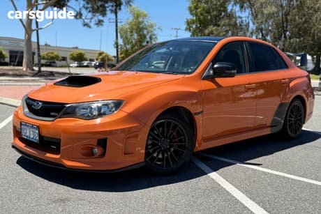 Orange 2012 Subaru Impreza Sedan 2.0I (Awd)