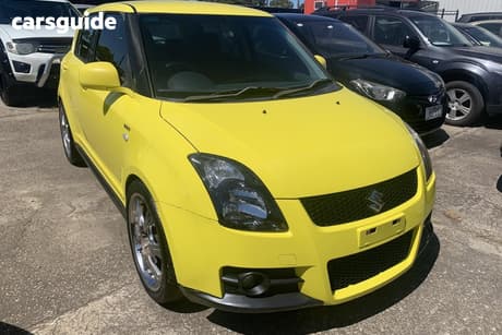 Yellow 2009 Suzuki Swift Hatchback Sport
