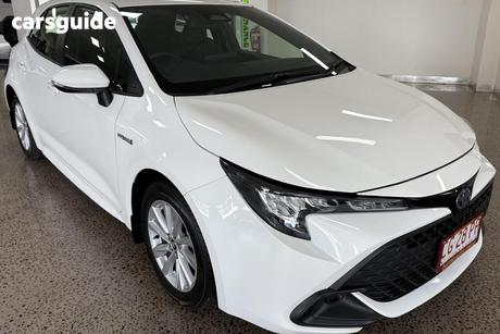 White 2024 Toyota Corolla Hatchback Ascent Sport + Conv Pk Hybrid