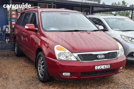 Red 2012 Kia Grand Carnival Wagon Sli