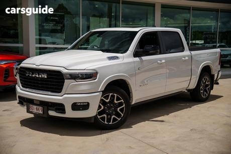 White 2025 RAM 1500 Crew Cab Utility Rebel Hurricane