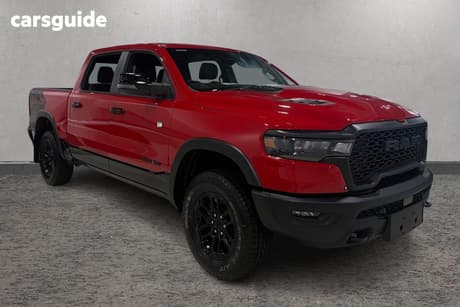 Red 2025 RAM 1500 Crew Cab Utility Rebel Hurricane