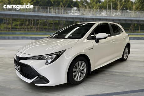White 2023 Toyota Corolla Hatchback Ascent Sport + Conv Pk Hybrid