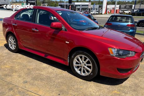 Red 2013 Mitsubishi Lancer Sedan Lx