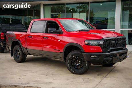 Red 2025 RAM 1500 Crew Cab Utility Rebel Hurricane
