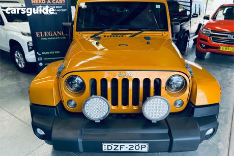 Yellow 2014 Jeep Wrangler Hardtop Overland