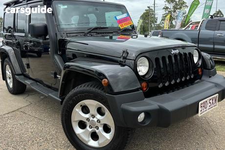 Black 2012 Jeep Wrangler Hardtop Unlimited Renegade Sport (4X4)