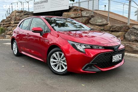 Red 2023 Toyota Corolla Hatchback Ascent Sport Hybrid