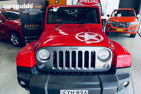 Red 2014 Jeep Wrangler Hardtop Renegade Sport (4X4)