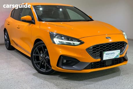 Orange 2021 Ford Focus Hatchback St