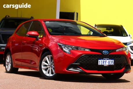 Red 2023 Toyota Corolla Hatchback Ascent Sport Hybrid