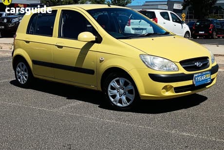 Yellow 2010 Hyundai Getz Hatchback S