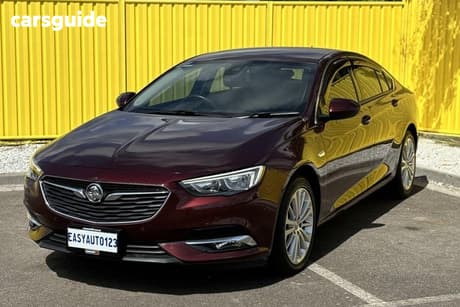 Red 2018 Holden Calais Liftback