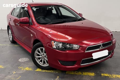 Red 2012 Mitsubishi Lancer Sedan Lx