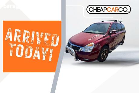 Red 2010 Kia Carnival Wagon S