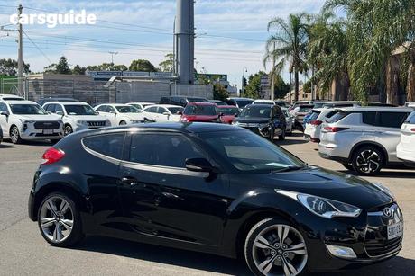 Black 2012 Hyundai Veloster Coupe +