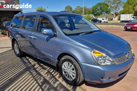 Blue 2010 Kia Grand Carnival Wagon Platinum