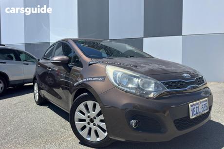 Brown 2012 Kia RIO Hatchback Si
