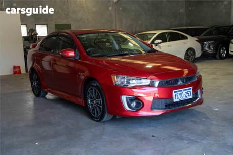 Red 2015 Mitsubishi Lancer Sedan Es Sport