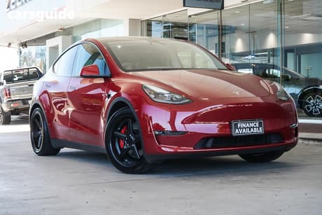 Red 2023 Tesla Model Y Wagon Performance