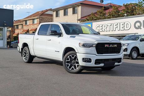 White 2025 RAM 1500 Crew Cab Utility Rebel Hurricane