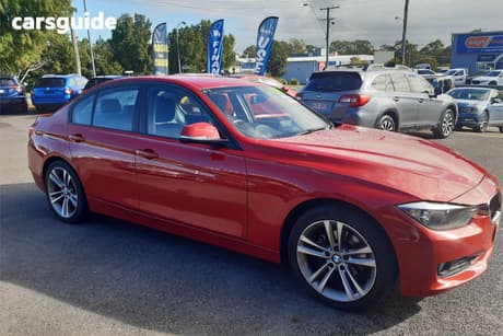 Red 2013 BMW 320I Sedan Luxury Line