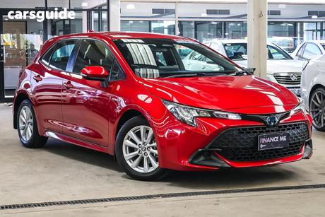 Red 2024 Toyota Corolla Hatchback Ascent Sport Hybrid