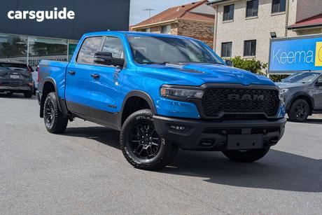 White 2025 RAM 1500 Crew Cab Utility Rebel Hurricane