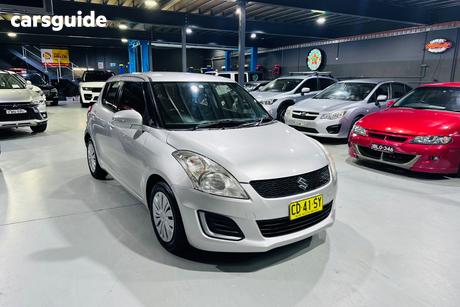 Silver 2015 Suzuki Swift Hatchback Gl