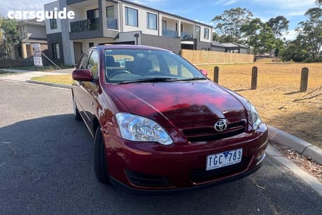 Red 2004 Toyota Corolla Hatchback Ascent Seca