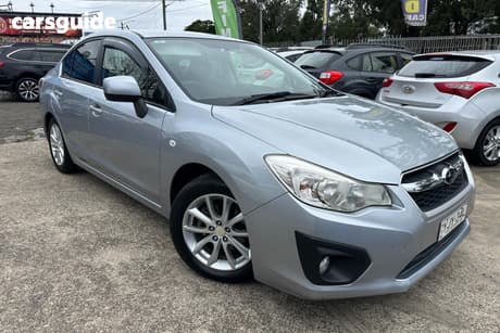 Silver 2013 Subaru Impreza Sedan 2.0I-L (Awd)