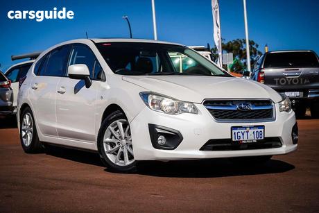 White 2012 Subaru Impreza Hatchback 2.0I-L (Awd)