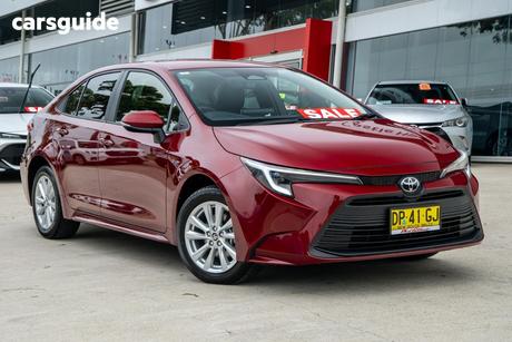 Red 2025 Toyota Corolla Sedan Sx Hev