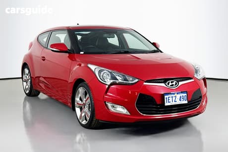 Red 2015 Hyundai Veloster Coupe +