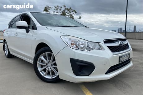 White 2013 Subaru Impreza Hatchback 2.0I (Awd)