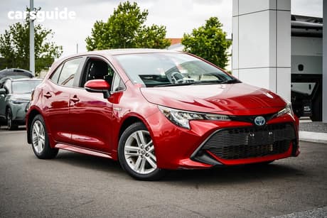 Red 2021 Toyota Corolla Hatchback Ascent Sport Hybrid