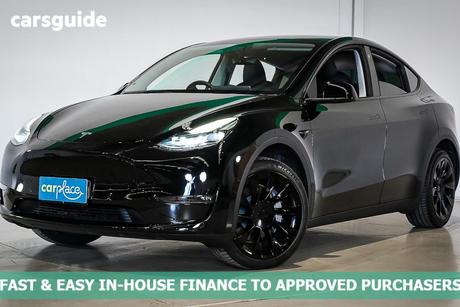 Black 2024 Tesla Model Y Wagon Long Range