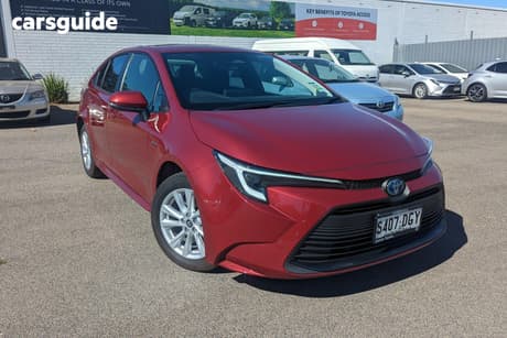 Red 2025 Toyota Corolla Sedan Sx Hev