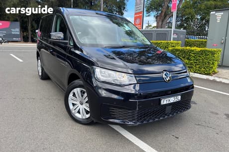 Black 2025 Volkswagen Caddy Van Cargo Tdi320