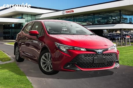 Red 2022 Toyota Corolla Hatchback Ascent Sport Hybrid