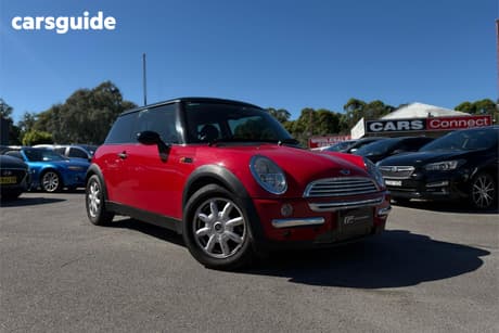 Red 2002 Mini Cooper Hatchback