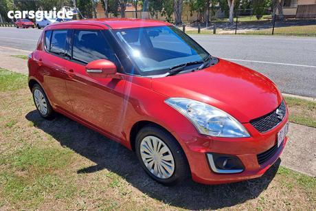 Red 2015 Suzuki Swift Hatchback Gl